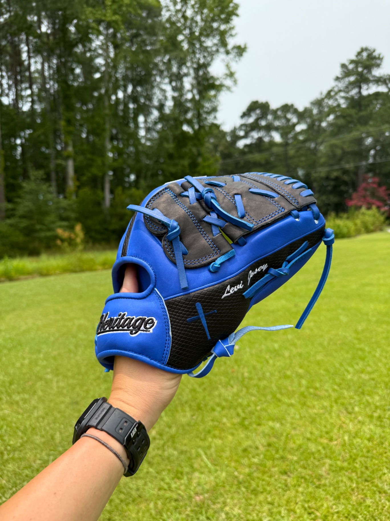 Blue and black Heritage glove personalized 'Levi Price'