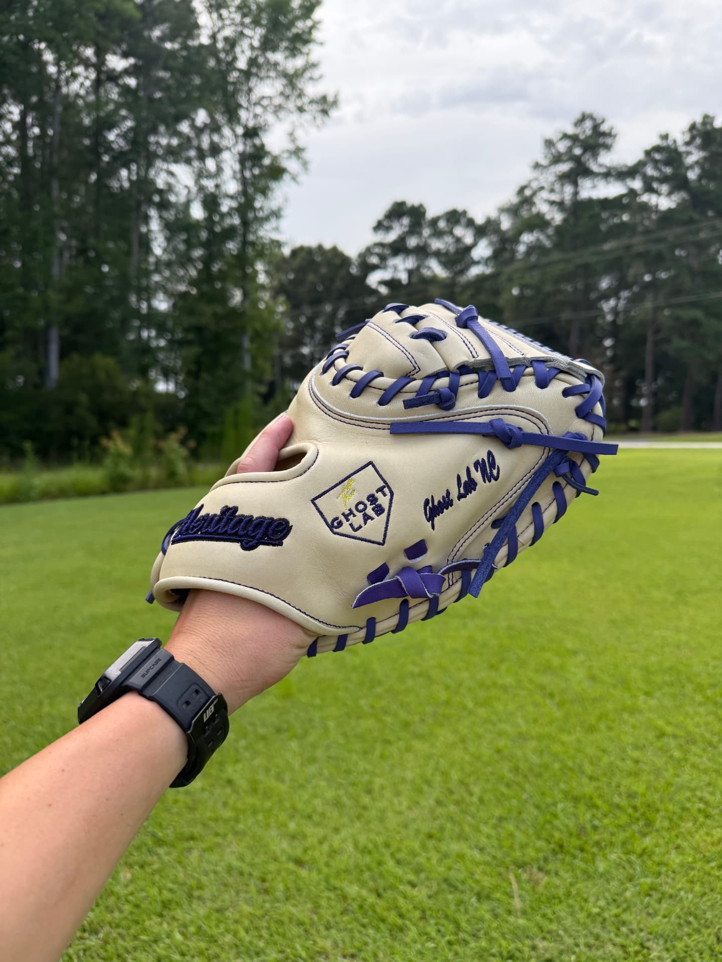 Cream and purple Heritage catcher's mitt with Ghost Lab NC embroidery