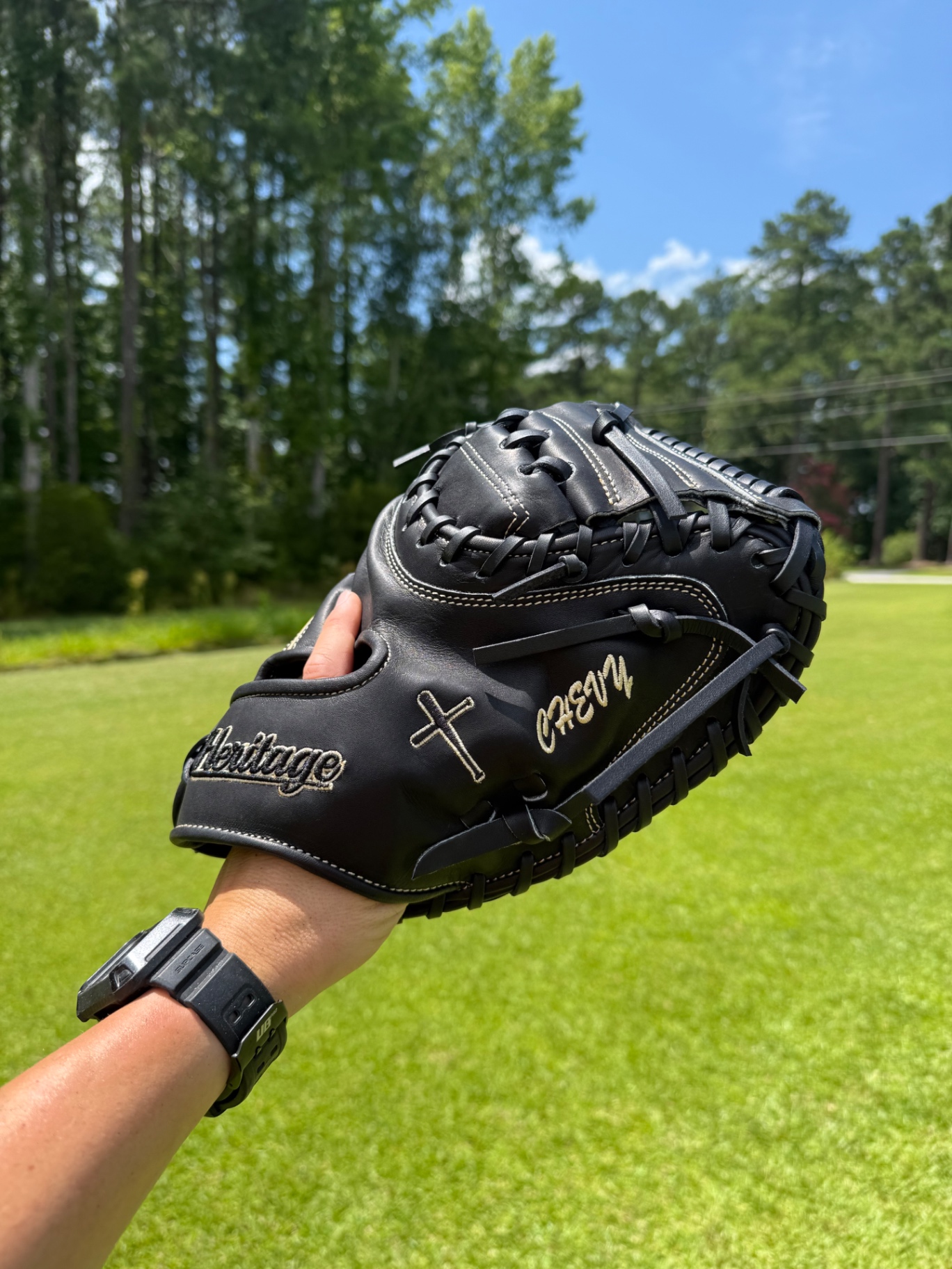 Black Heritage catcher's mitt with cross and 'Chevy' personalization