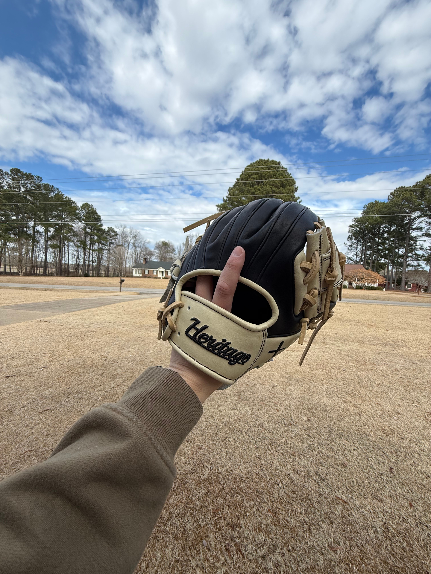 Heritage glove back view with embroidered script